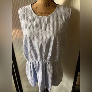 J. Crew sleeveless casual drop waist top. Front is cotton with tight striping.